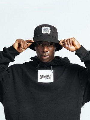 Stylish black CG logo bucket cap featuring iconic branding.